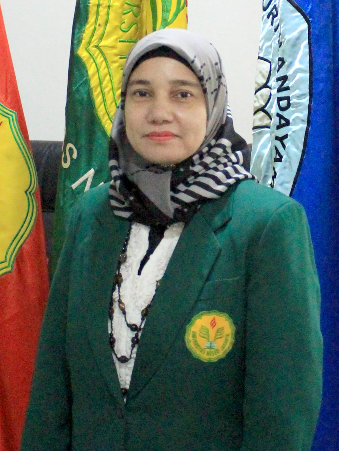 Dr. Kurniawati, M.Si.